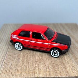 Red and Black Volkswagen Golf Die-Cast Toy Hatchback Car